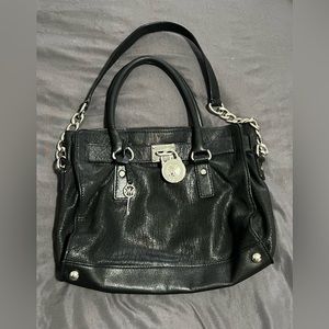 Michael Kors black leather bag with silver lock and key detail